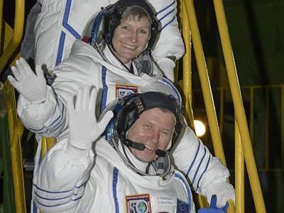 Expedition 50 crewmembers ESA astronaut Thomas Pesquet, top, NASA astronaut Peggy Whitson, middle, and Russian cosmonaut Oleg Novitskiy of Roscosmos wave farewell before boarding their Soyuz MS-03 spacecraft for launch Thursday, Nov. 17, 2016, (Kazakh Time) in Baikonur, Kazakhstan. The trio will launch from the Baikonur Cosmodrome in Kazakhstan the morning of November 18 (Kazakh time.) All three will spend approximately six months on the orbital complex. Photo Credit: (NASA/Bill Ingalls)