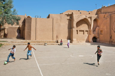 Children in the Middle East Playing Soccer